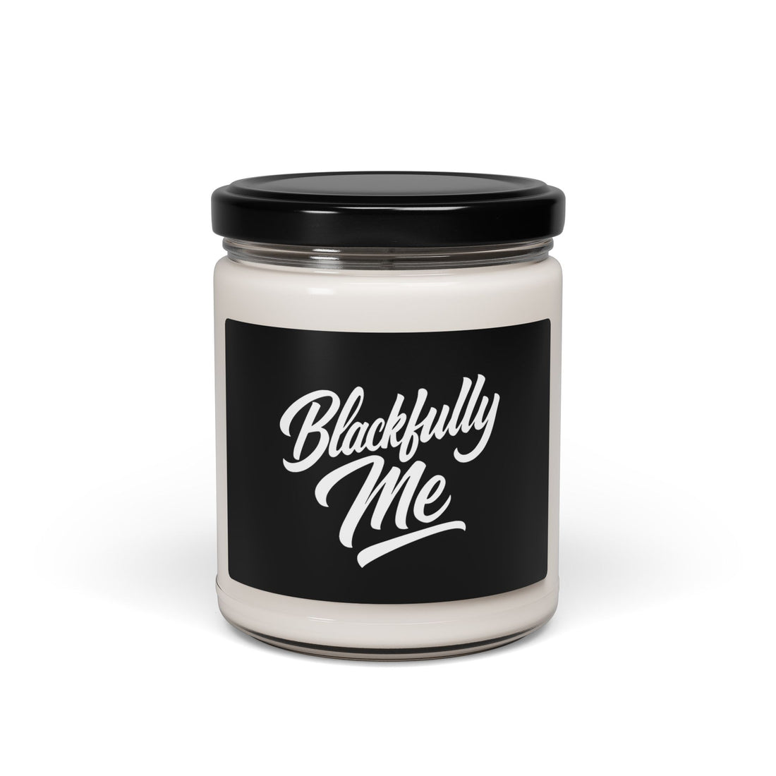 Candle in a jar labeled 'Blackfully Me' with a guitar and string lights in the background