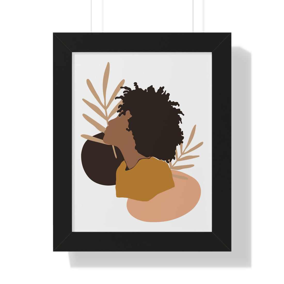 Framed artwork of a stylized silhouette with leaves on a white background