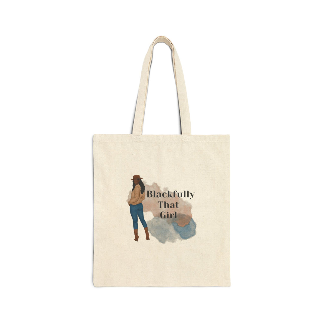 Woman walking outdoors holding a tote bag with a graphic design.