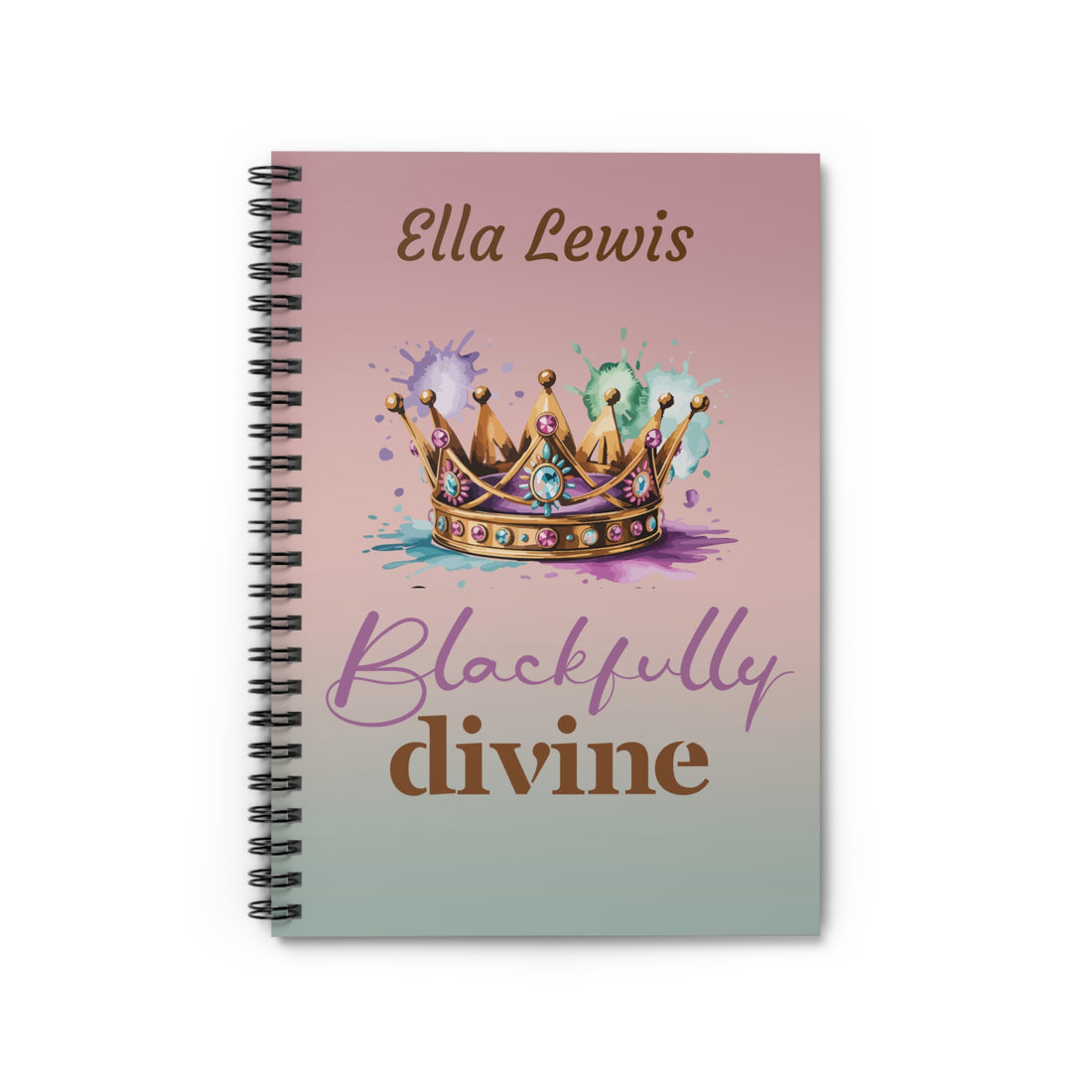 Notebook with a crown design and text on a pink and blue gradient background
