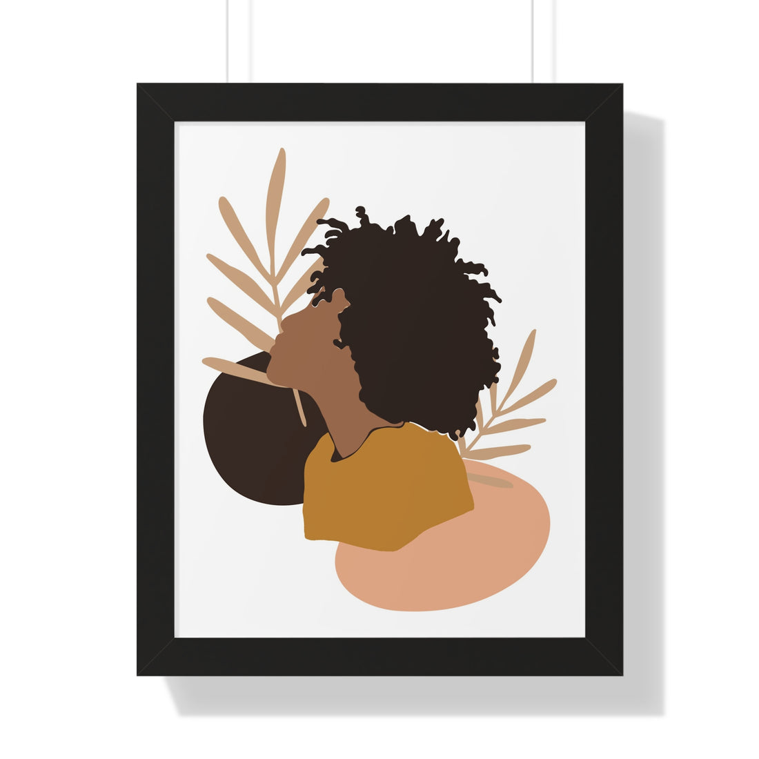 Framed artwork of a stylized silhouette with leaves on a white background
