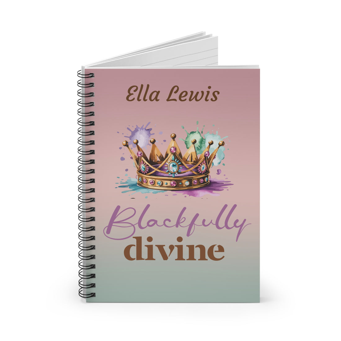 Notebook with a crown design and text on a pink and blue gradient background